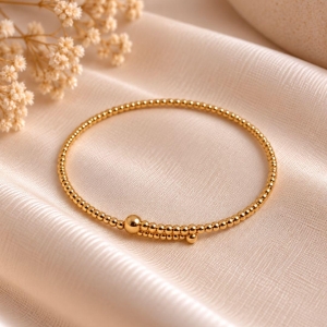 BRACELETE BOLINHAS