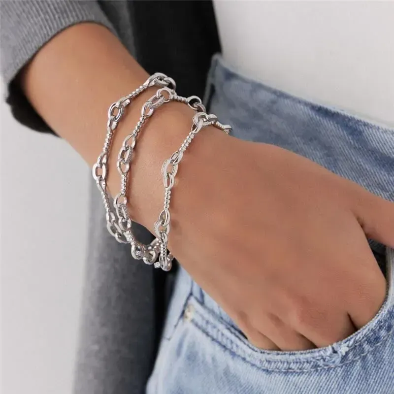 PULSEIRA ELOS OVAIS E TRANÇADOS COM ZIRCÔNIAS RÓDIO