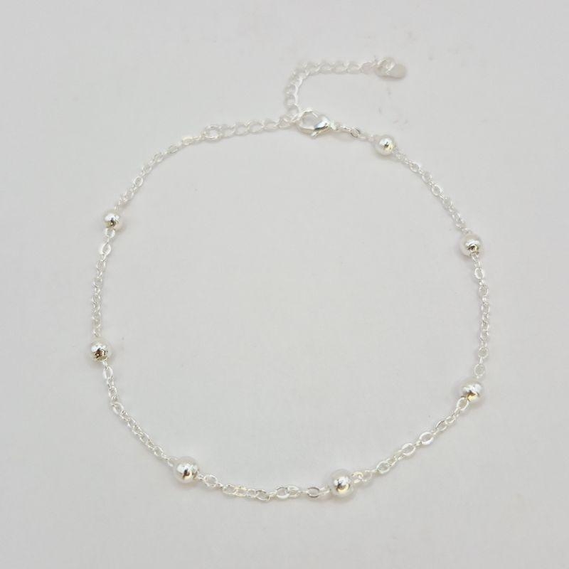 TORNOZELEIRA COM BOLINHAS