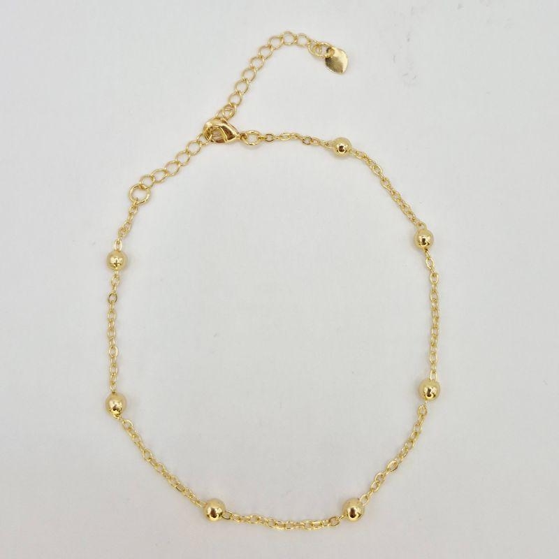 TORNOZELEIRA COM BOLINHAS