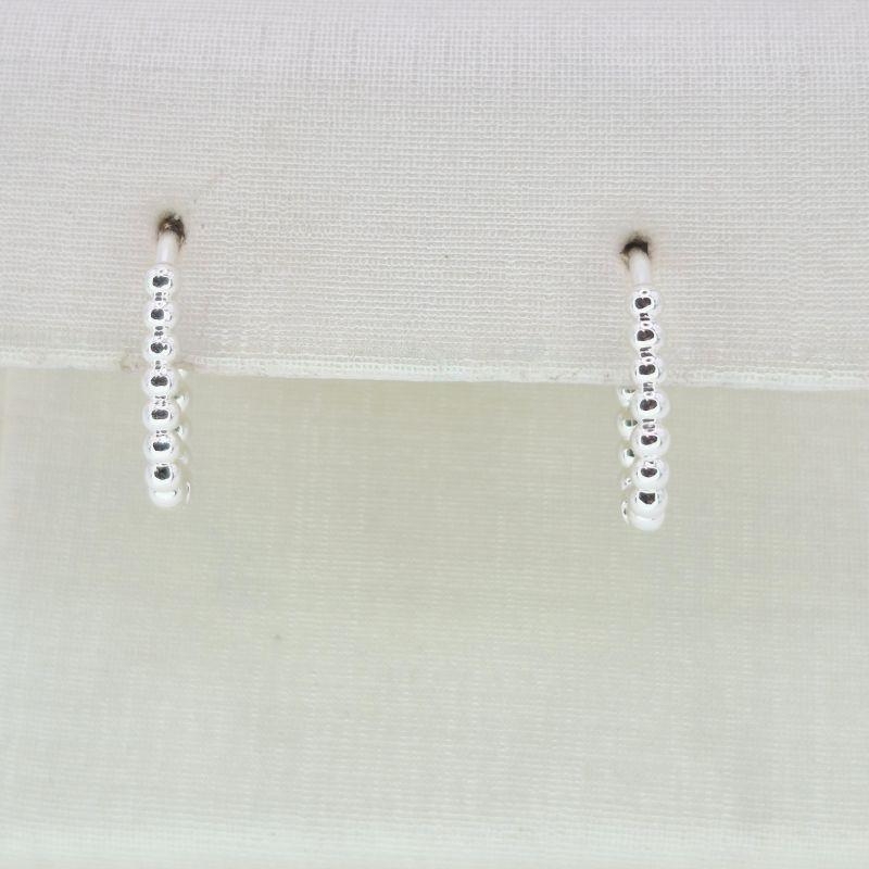 BRINCO OVAL BOLINHAS