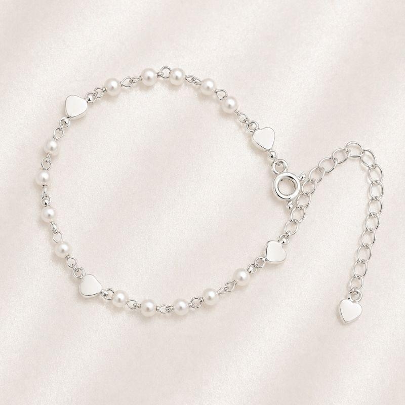 PULSEIRA PEROLAS COM CORACOES