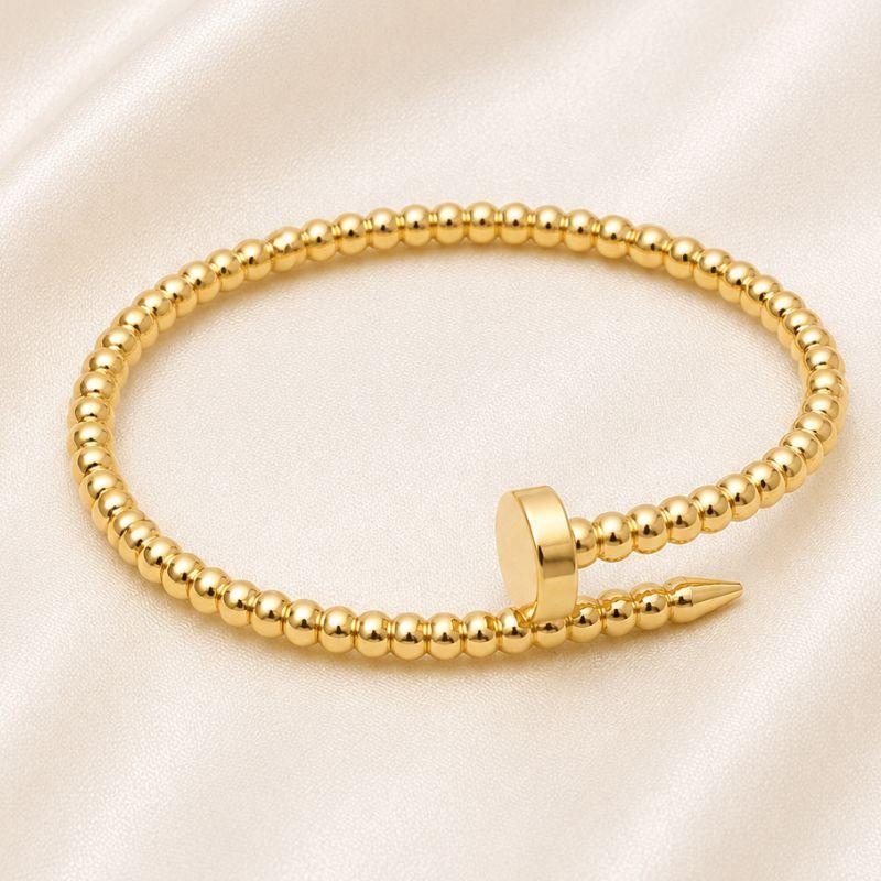 BRACELETE PREGO DE BOLINHAS