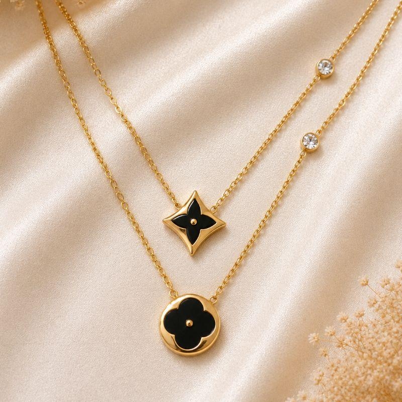 COLAR ESTRELA E FLOR PRETAS
