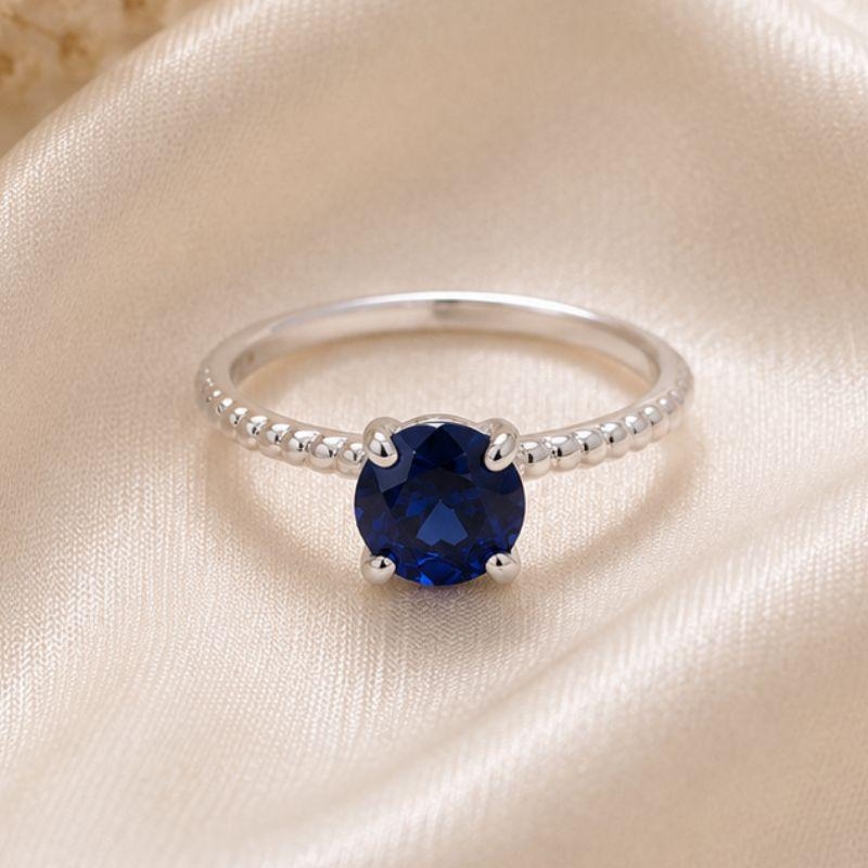 ANEL ARO BOLINHA COM PEDRA AZUL