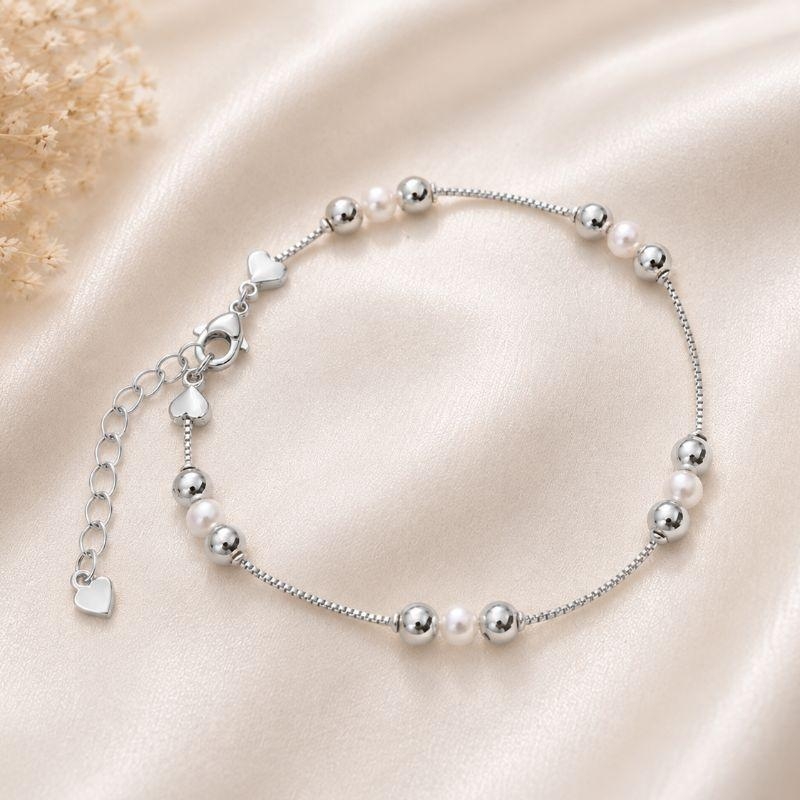 PULSEIRA BOLINHAS E PEROLAS