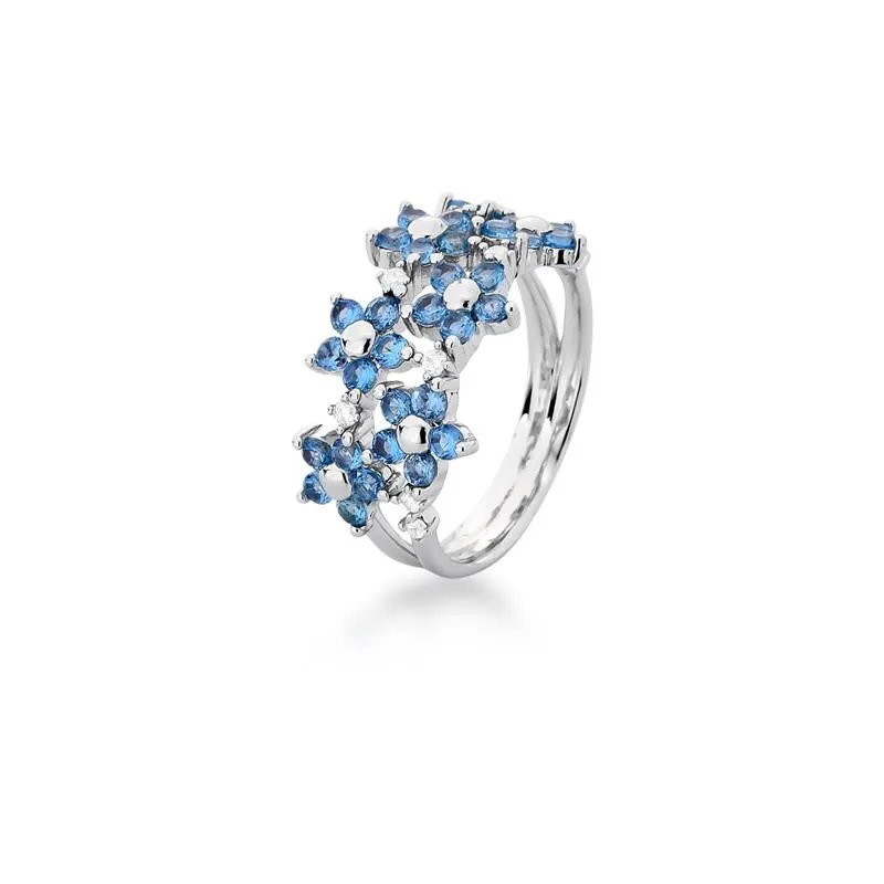 ANEL COM DUAS VOLTAS DE FLORES E CRISTAL AZUL
