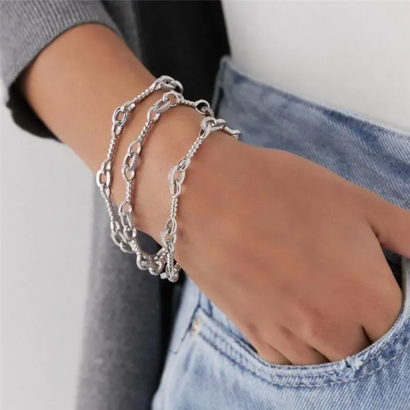 PULSEIRA ELOS OVAIS E TRANÇADOS COM ZIRCÔNIAS RÓDIO