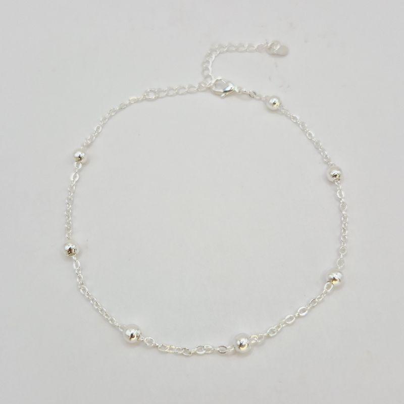 TORNOZELEIRA COM BOLINHAS