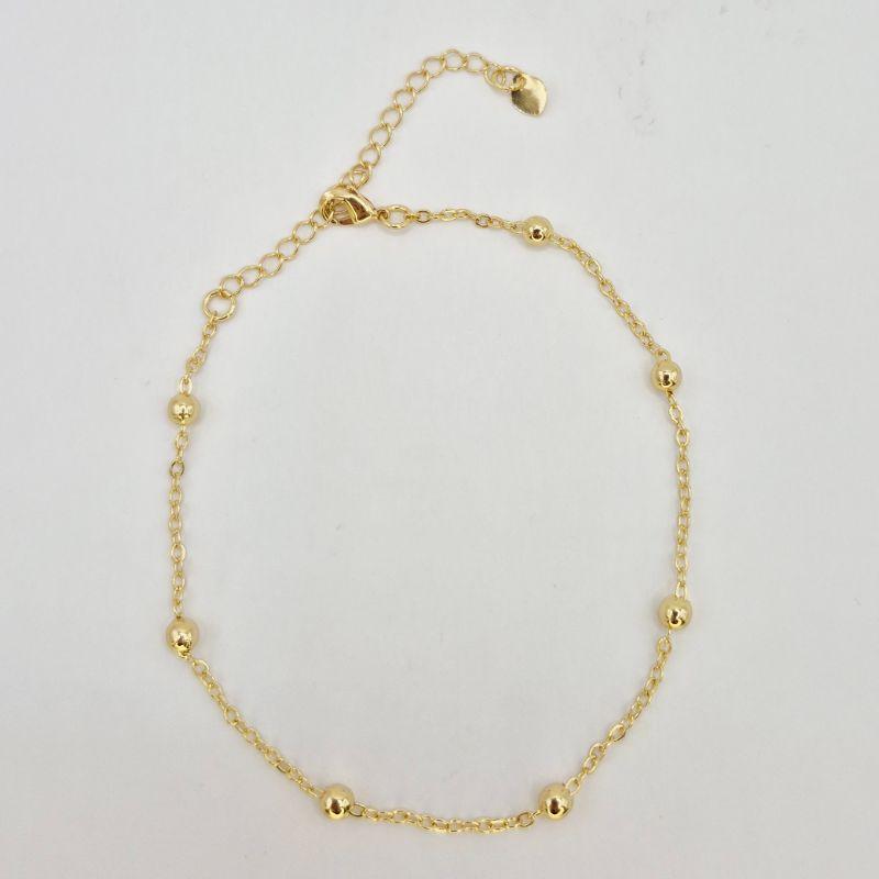 TORNOZELEIRA COM BOLINHAS