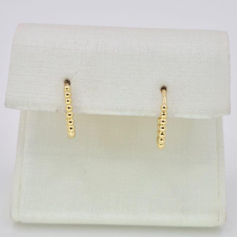 BRINCO OVAL BOLINHAS