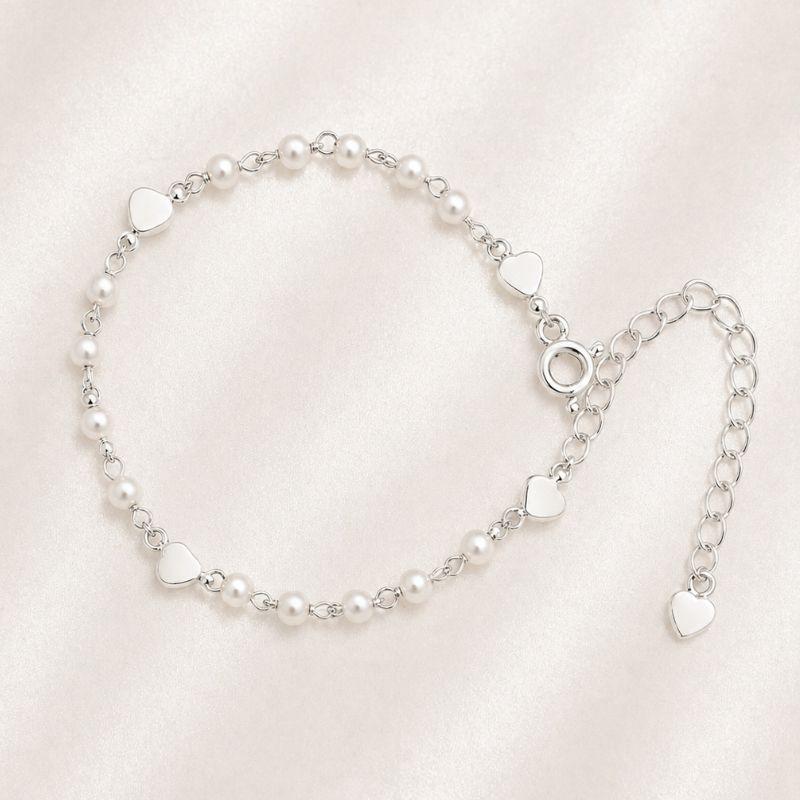 PULSEIRA PEROLAS COM CORACOES